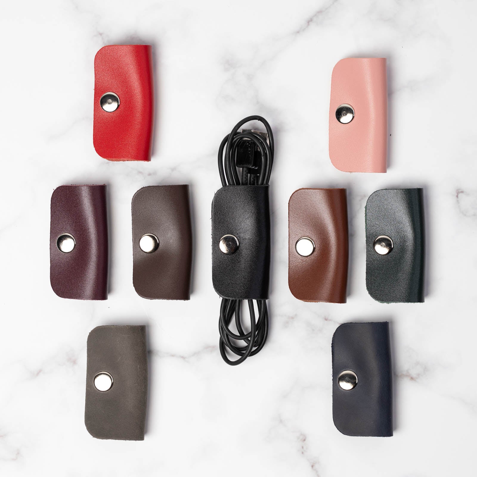 Зажим-фіксатор для кабелів